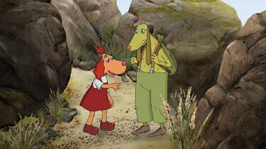 Szenenbild: Lotte und ihr Onkel diskutieren zwischen großen Steinen stehend
