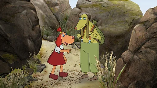 Szenenbild: Lotte und ihr Onkel diskutieren zwischen großen Steinen stehend