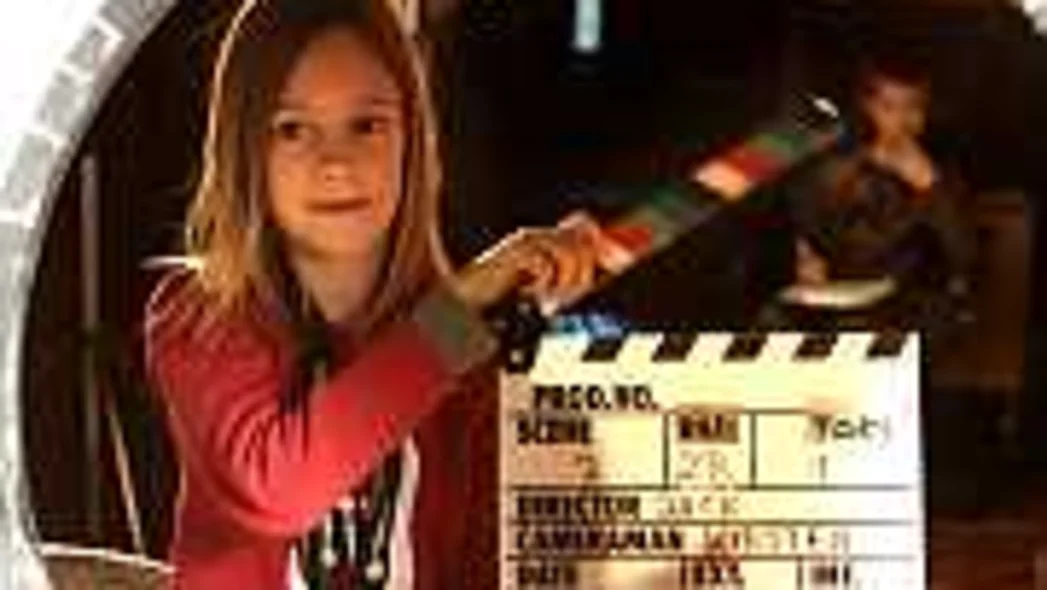 M&auml;dchen mit Filmklappe